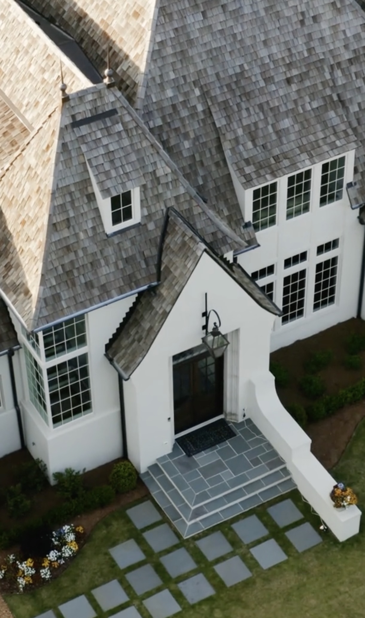Aerial view of luxury home with security coverage